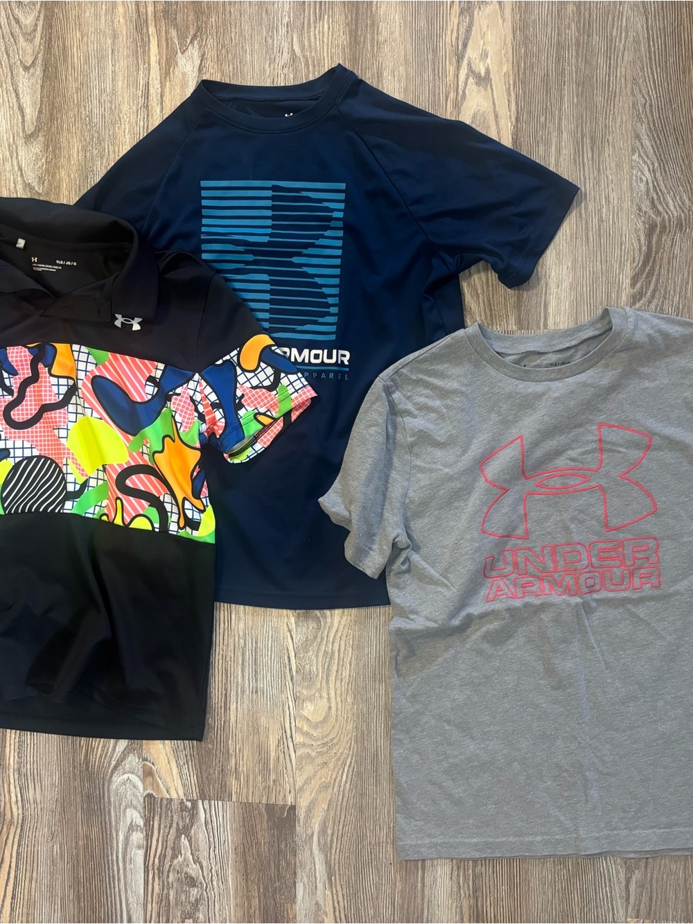 Three Under Armour YLarge Tops
